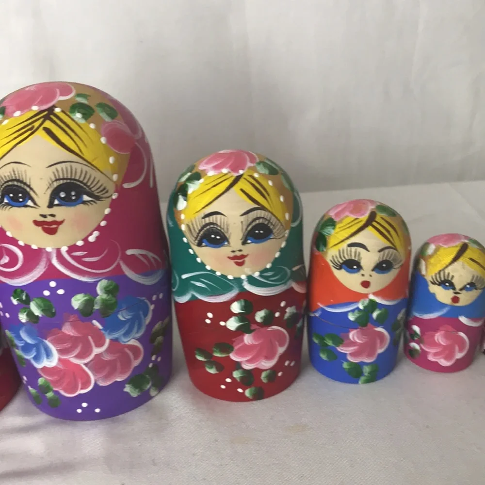 Beautifully decorated nesting dolls set